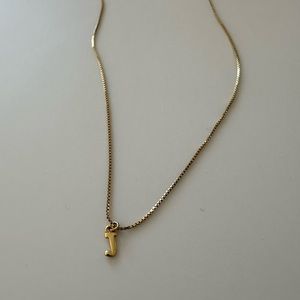 Simple gold “J” necklace